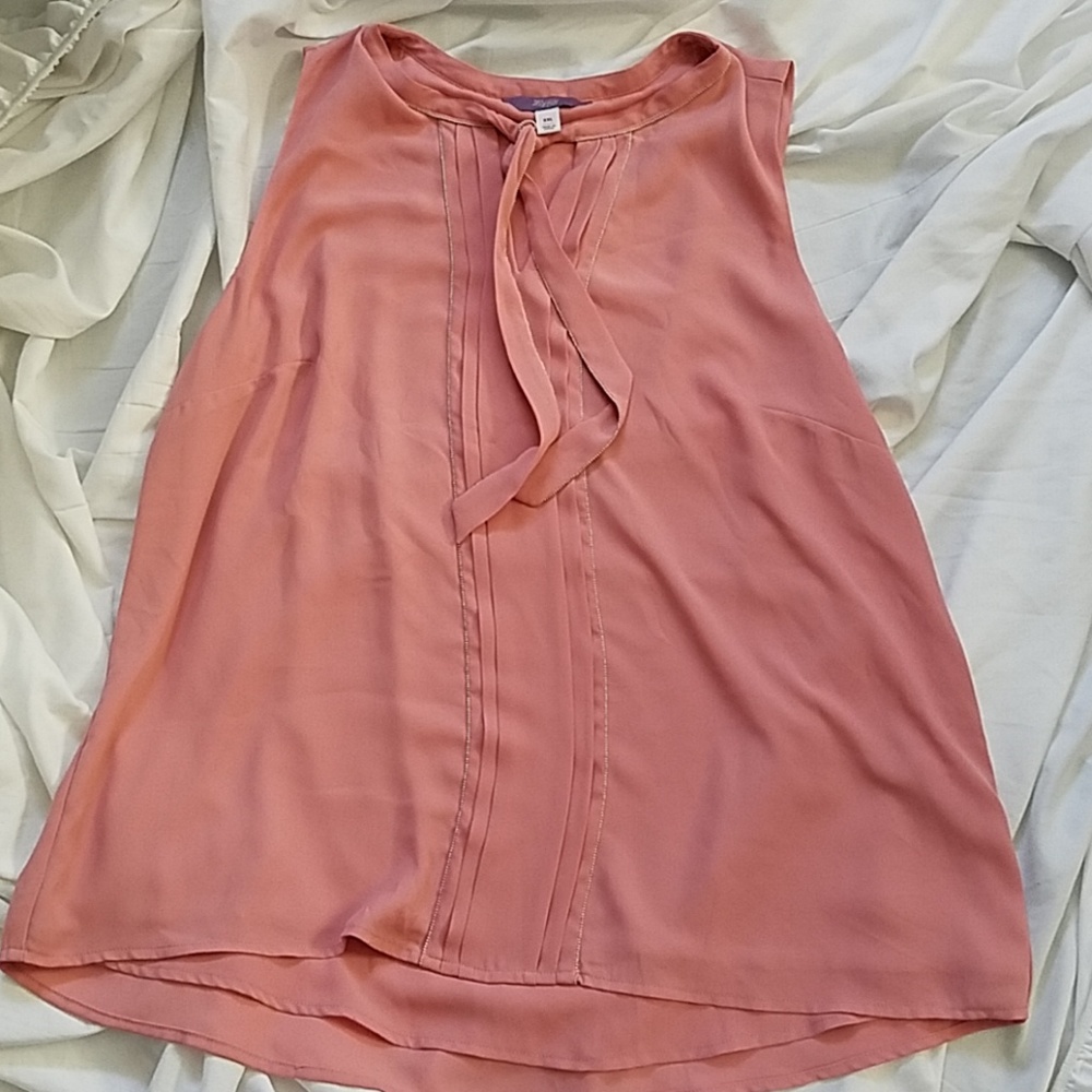 Pink sleeveless blouse